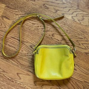 Mustard yellow fossil camera bag